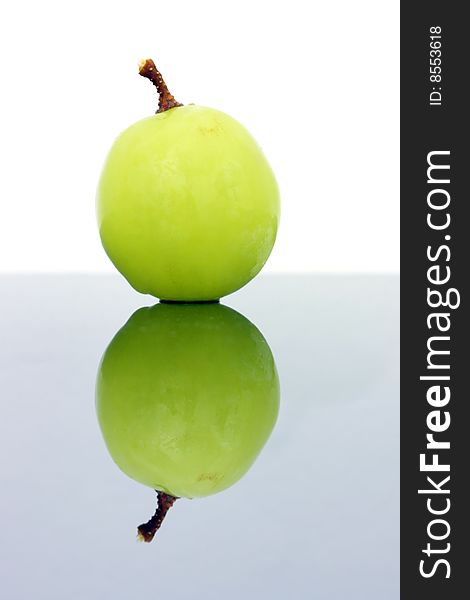 Close up of a green grapes isolated over white background.