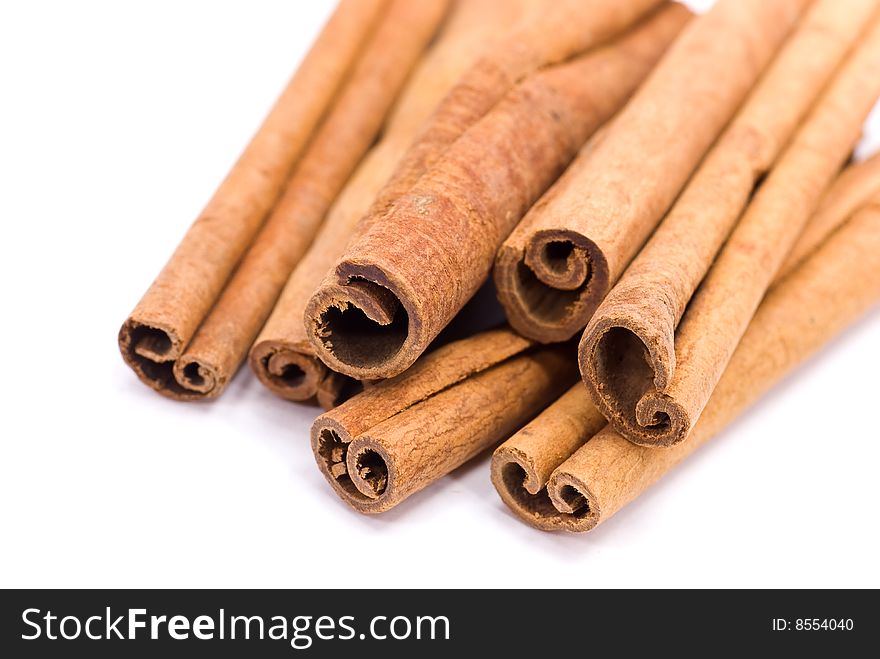 Cinnamon Sticks on white - tight depth of field.