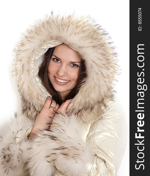 The smiling and happy girl isolated on the white background