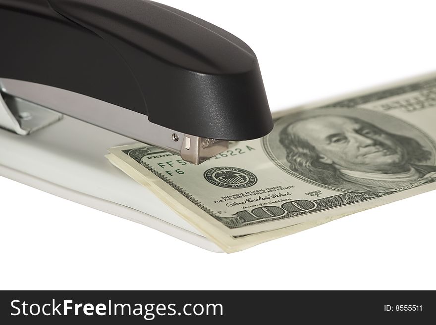 Stapler with stack of dollars isolated on white background. Stapler with stack of dollars isolated on white background