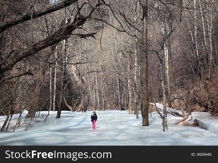 Girl walking at winter time. Girl walking at winter time.