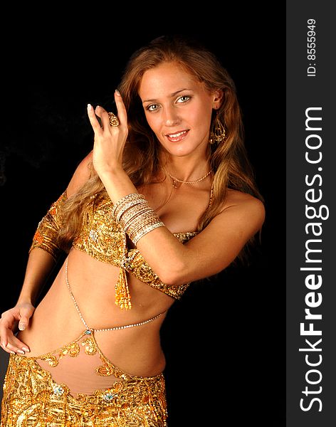 Beautiful long hair blonde woman in arabic dance costume. Beautiful long hair blonde woman in arabic dance costume