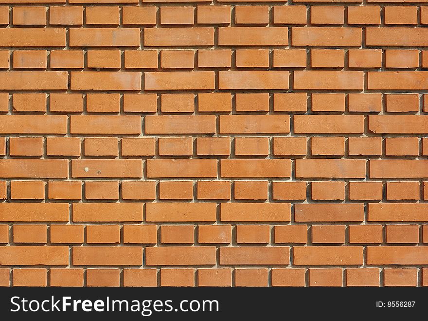 Closeup of a brick wall with red bricks