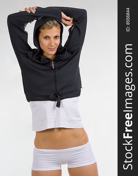 Slim athletic blond wearing sport clothing isolated
