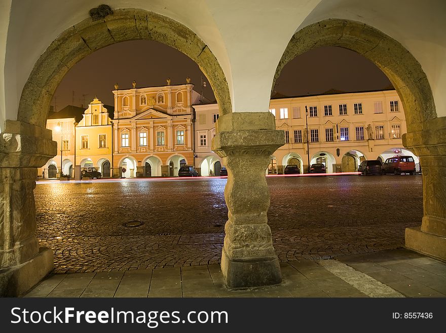 Arcade with town square in Litomysl at night lighting. UNESCO heritage.