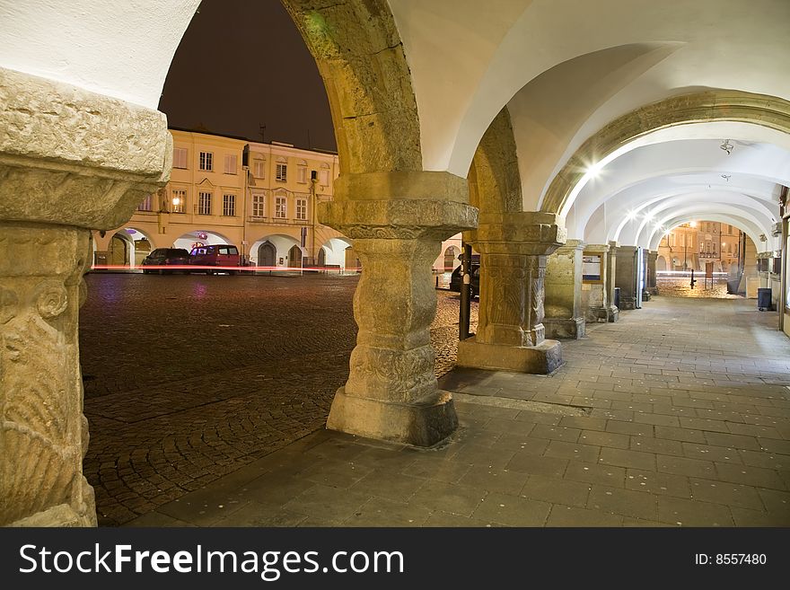 Arcade with town square in Litomysl at night lighting. UNESCO heritage.