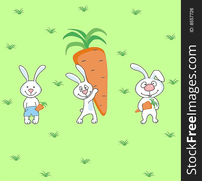 Rabbits with carrots on a green meadow