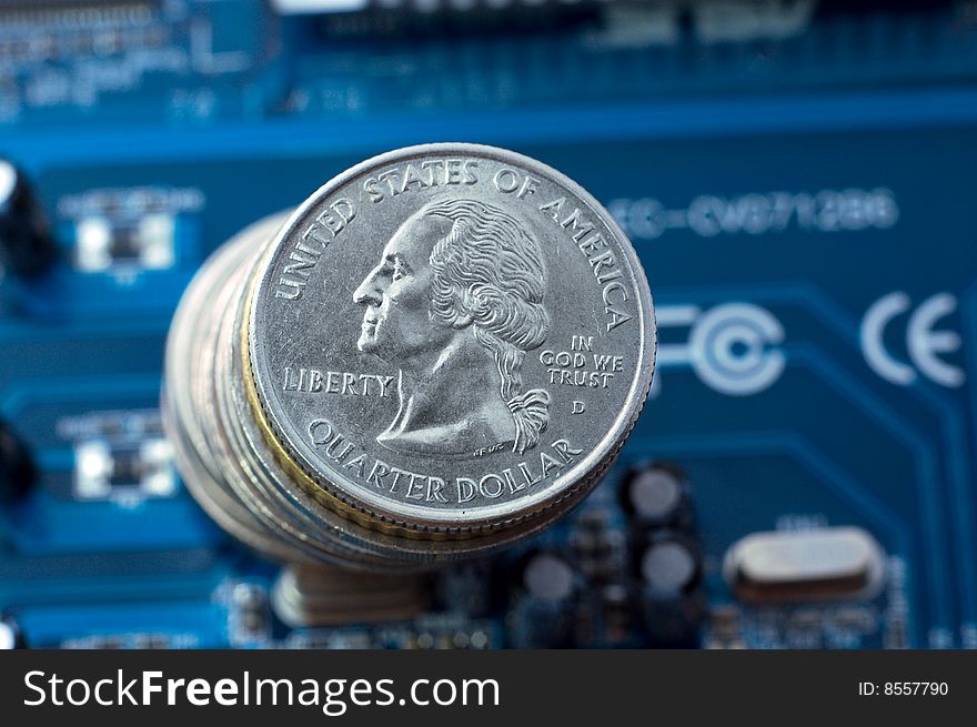 Make money on IT: quarter dollar coins over microcircuit