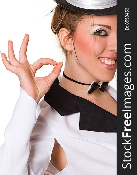 Sexy woman with small top hat making 'ok' gesture. Sexy woman with small top hat making 'ok' gesture