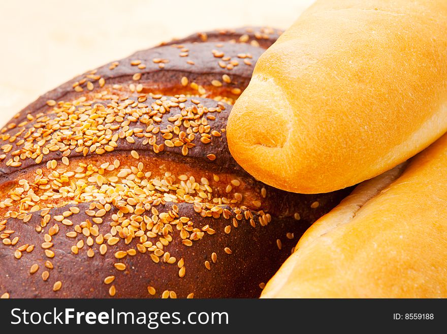 Rye bread and two baguettes, shot closeup