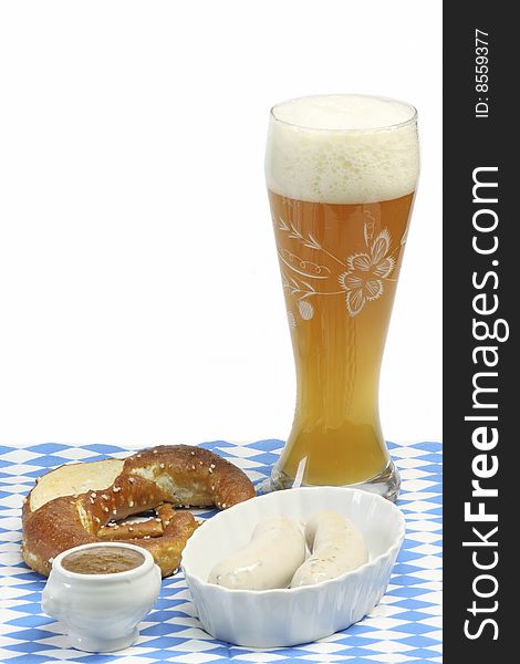 Bavarian veal sausage with mustard, pretzel and beer