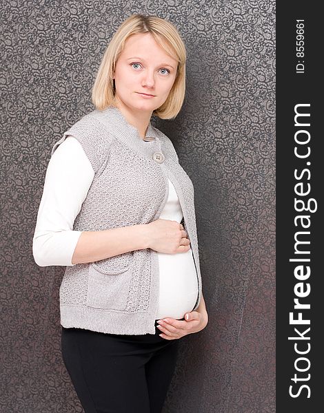 Pregnant female on a white background. Pregnant female on a white background