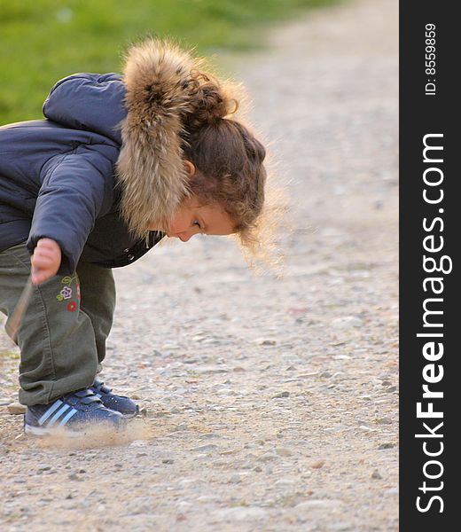 Little baby play in a park