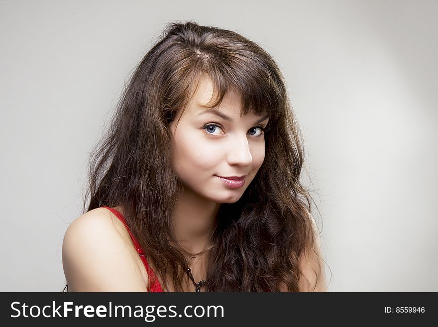 Picture of a beautiful brunette girl in red dress