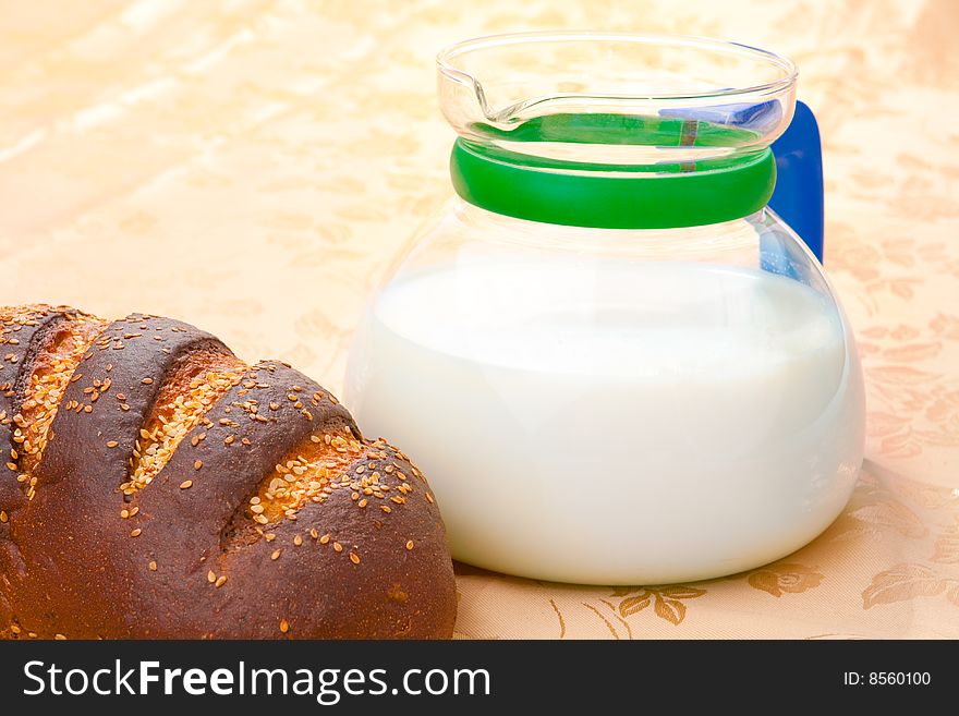 Rye bread and jug with milk. Rye bread and jug with milk