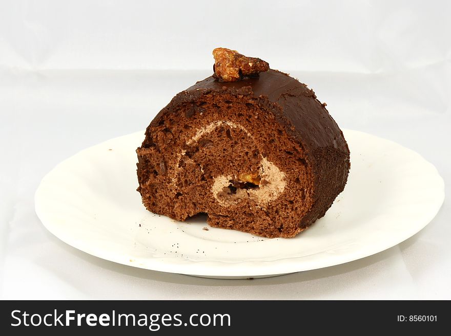 Chocolate cake with nut on top