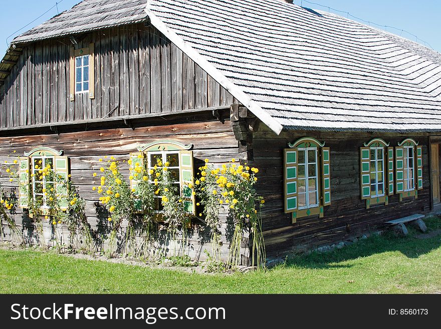 Old wooden countryside house with flours, Lithuania. Old wooden countryside house with flours, Lithuania