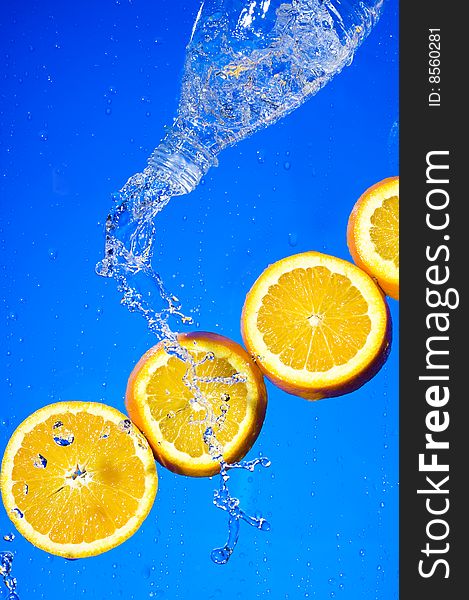 Orange with creative splashing water