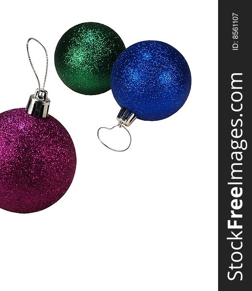 Three colorful Christmas Ornaments on a White Background.