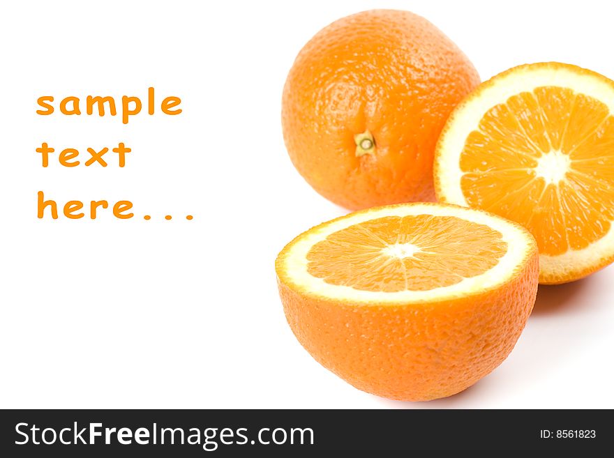 Fresh oranges closeup on white background