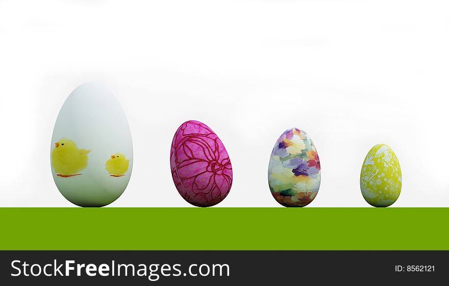 Four easter eggs on grass