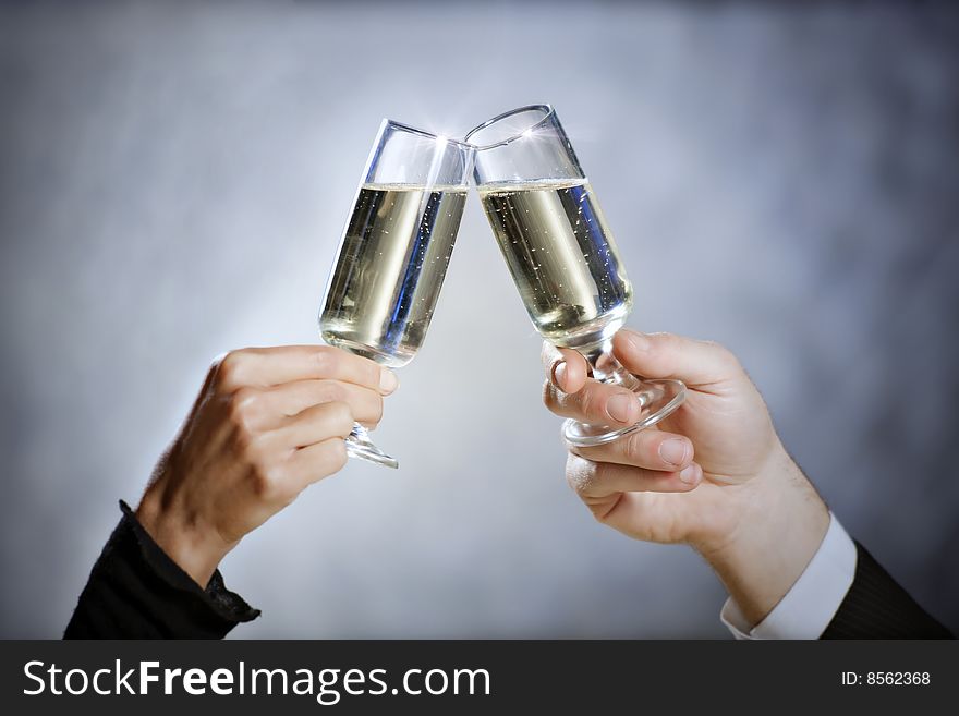 Cropped view of heterosexual couple toasting. Copy space