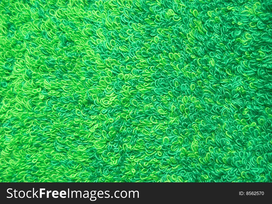 Beautiful background from a green towel.