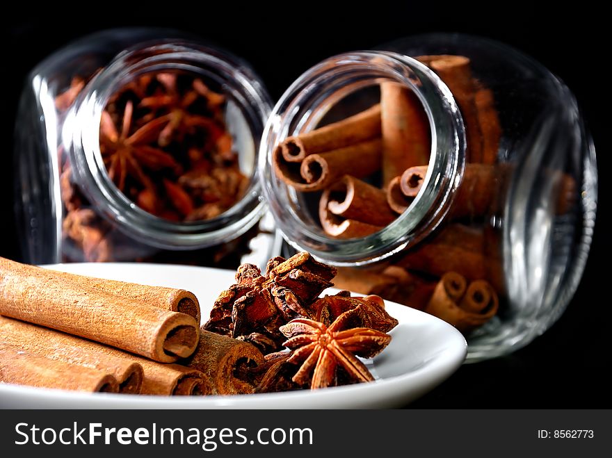 Cinnamon Stick and Anise Star in transparent container. Cinnamon Stick and Anise Star in transparent container