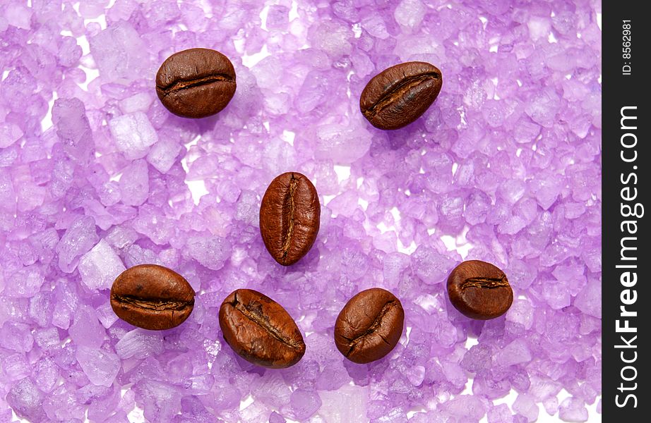 Physiognomy from coffee grains on a background of sea salt. Physiognomy from coffee grains on a background of sea salt.