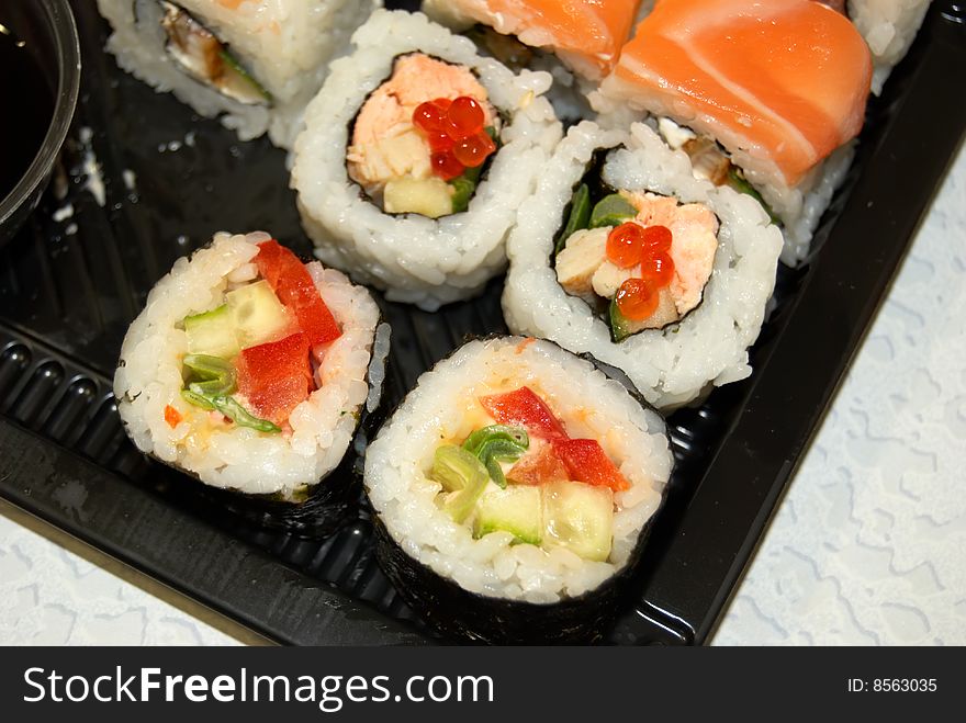 Appetizing Japanese dish, rolls from a fresh fish. Appetizing Japanese dish, rolls from a fresh fish.