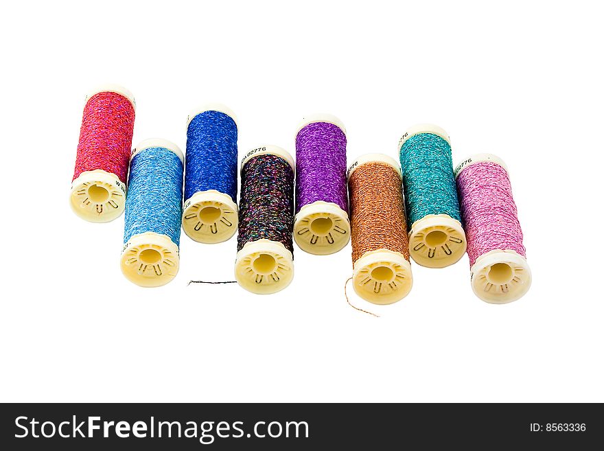 Threads on spool isolated on white background