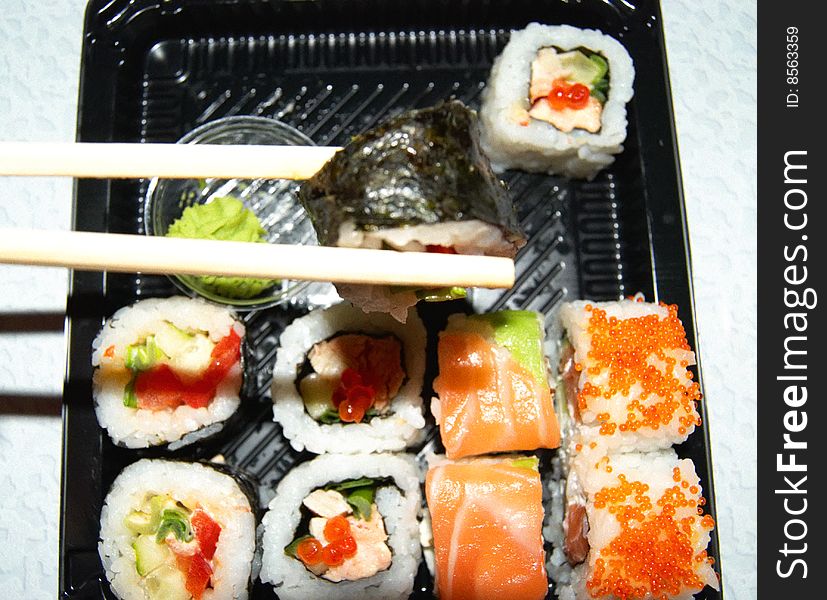 Appetizing Japanese dish, rolls from a fresh fish. Appetizing Japanese dish, rolls from a fresh fish.