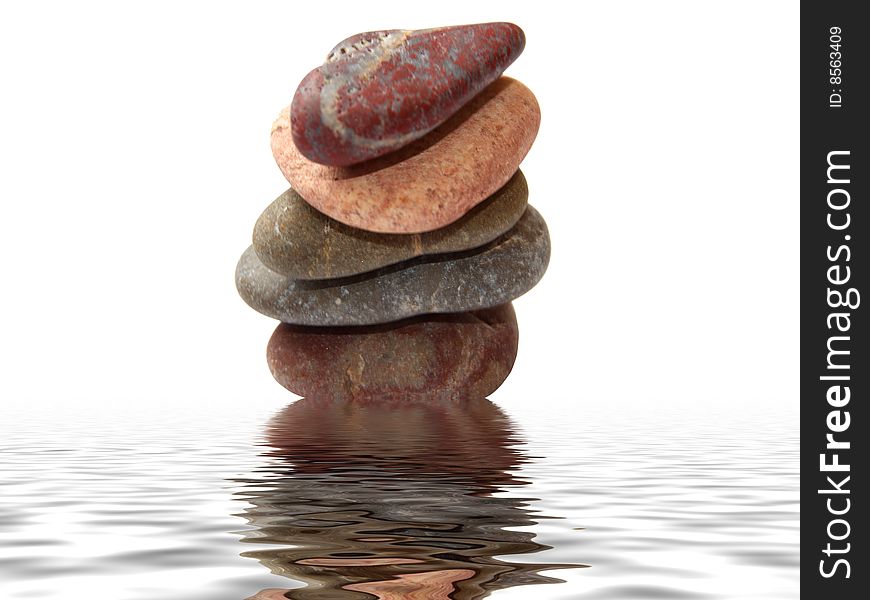 Stones for spa procedures on a glass water. Stones for spa procedures on a glass water.