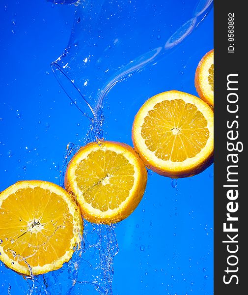 Orange with creative splashing water