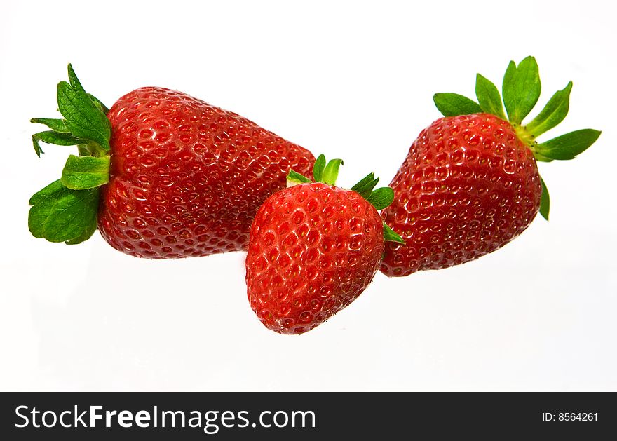 Several large and red sweet strawberries. Several large and red sweet strawberries.