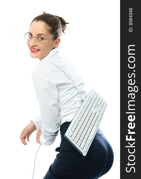 Happy young businesswoman carrying a keyboard on her back. Happy young businesswoman carrying a keyboard on her back