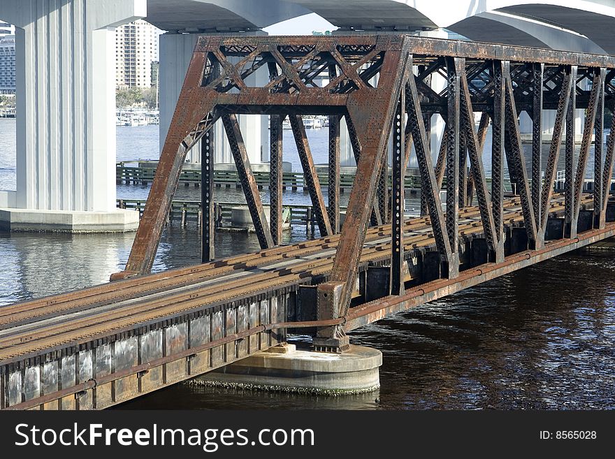 Railroad Bridge over a River in a Downtown. Railroad Bridge over a River in a Downtown