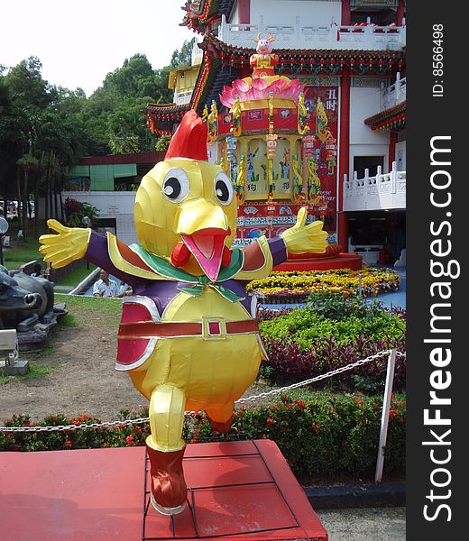 A bright figure representing the rooster from the Chinese zodiac in Kuala Lumpur, Malaysia. A bright figure representing the rooster from the Chinese zodiac in Kuala Lumpur, Malaysia.