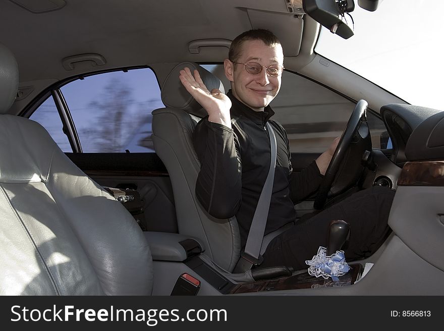 Merry young man after rulm car.