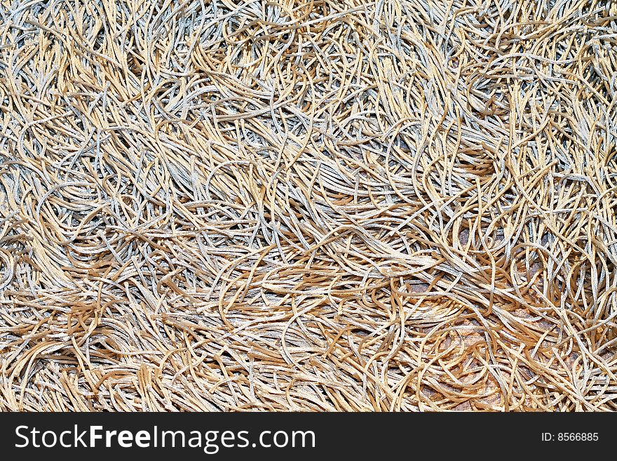 Close up shot of spaghetti carpet material