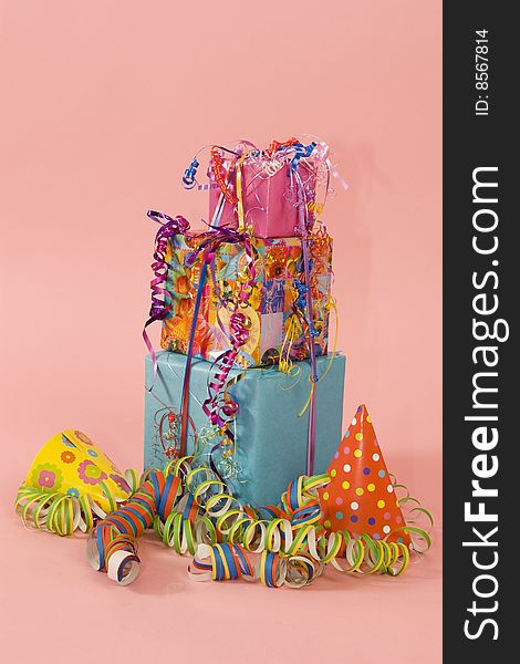 Stock of colorfull presents with party decoration