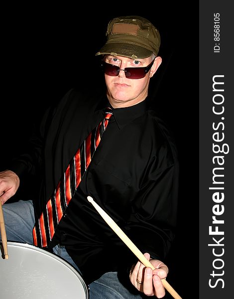 A drummer in a rock and roll band.