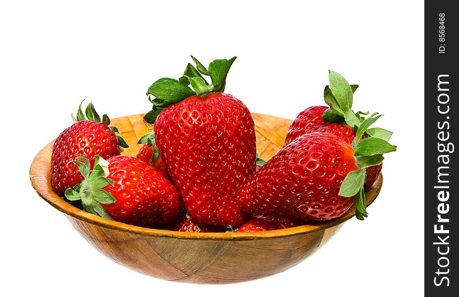 Several large and red sweet strawberries in bowl. isolated. Several large and red sweet strawberries in bowl. isolated