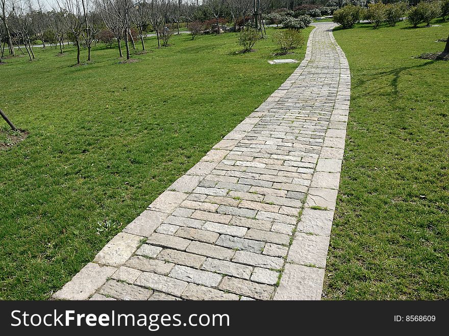 Garden stone path with grass. Garden stone path with grass