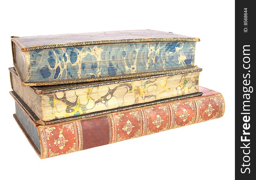 A pile of old leather bound books isolated on a white background