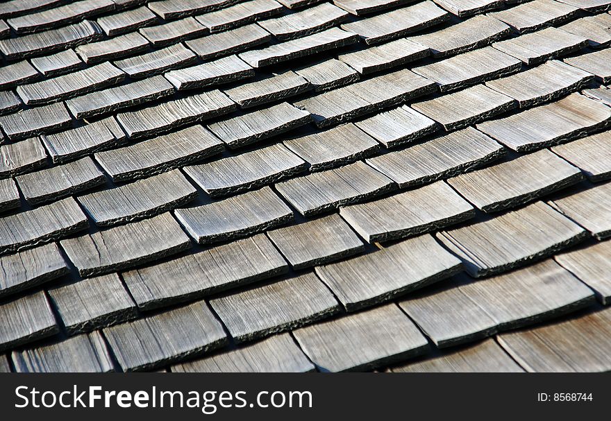 Cedar shakes from British Columbia as a roofing material weather to a silvery grey colour and last approximately 50 years.