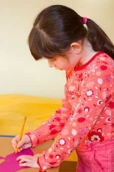 Girl Drawing Stock Images