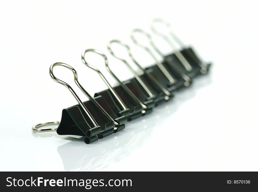 Paper clips isolated against a white background. Paper clips isolated against a white background