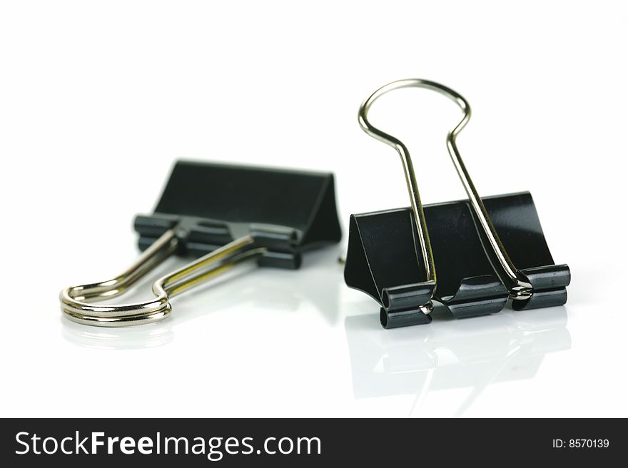 Paper clips isolated against a white background. Paper clips isolated against a white background