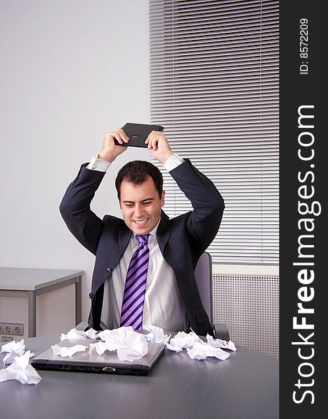 Businessman Breaking Off Calculator